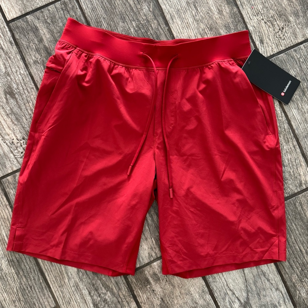 Lululemon T.H.E. Linerless Short 9" sport red workout shorts